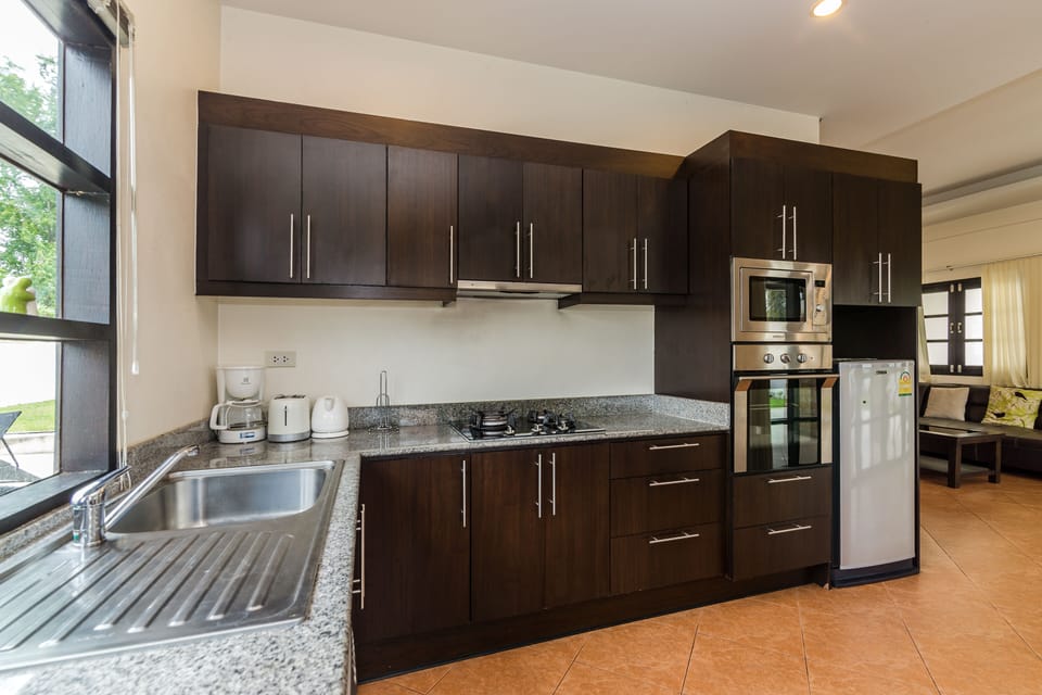 Standard Villa, 3 Bedrooms, Non Smoking, Kitchen | Private kitchen | Full-size fridge, microwave, oven, stovetop