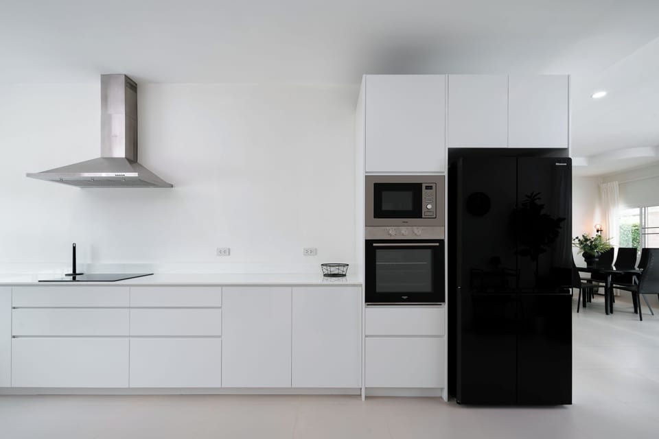 Standard Villa, 4 Bedrooms, Non Smoking, Kitchen | Private kitchen | Full-size fridge, microwave, oven, stovetop