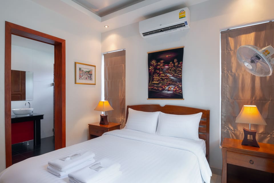 Superior Villa, 4 Bedrooms, Non Smoking, Kitchen | 4 bedrooms, blackout drapes, iron/ironing board, free cribs/infant beds