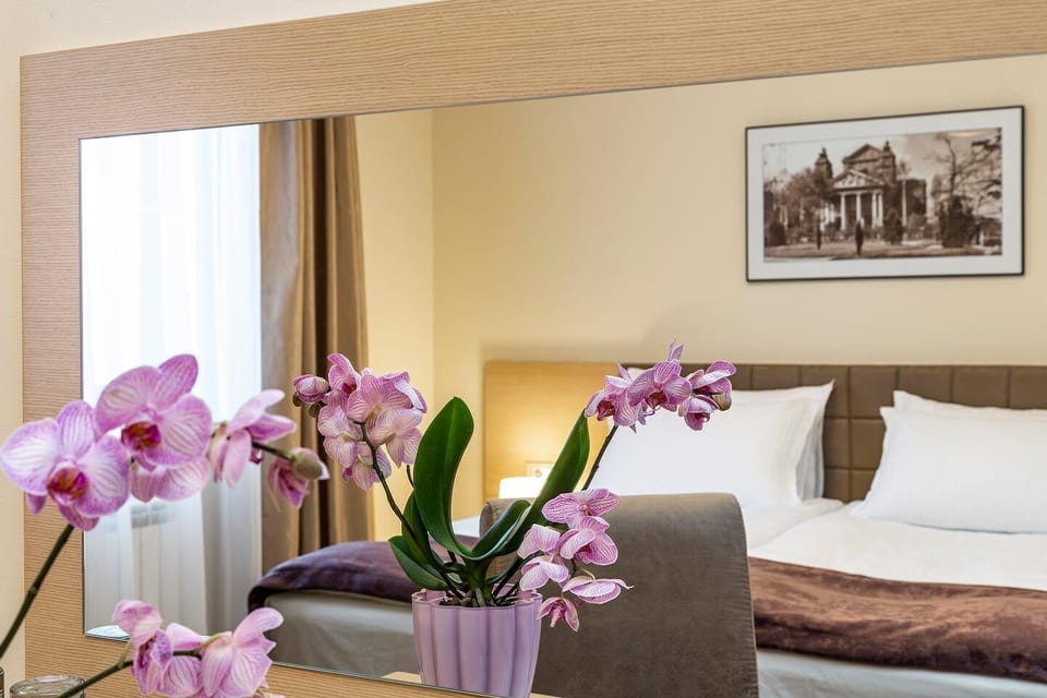 Standard Double or Twin Room | Living area | Flat-screen TV