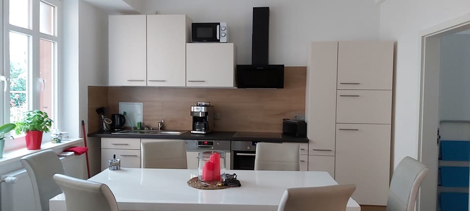 Apartment, 4 Bedrooms | Private kitchen | Fridge, microwave, oven, stovetop