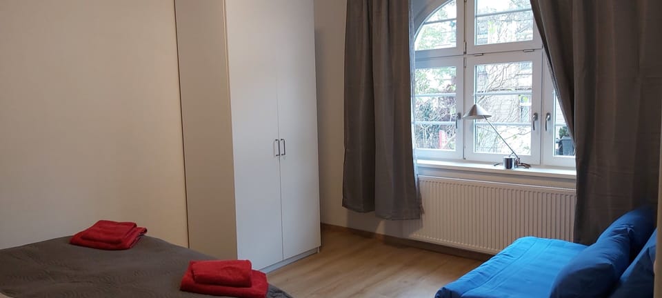 Apartment, 4 Bedrooms | 4 bedrooms, blackout drapes, iron/ironing board, travel crib