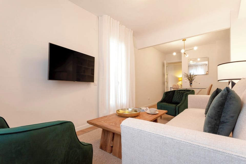 Apartment (2 Bedrooms) | Living area | 32-inch TV with cable channels