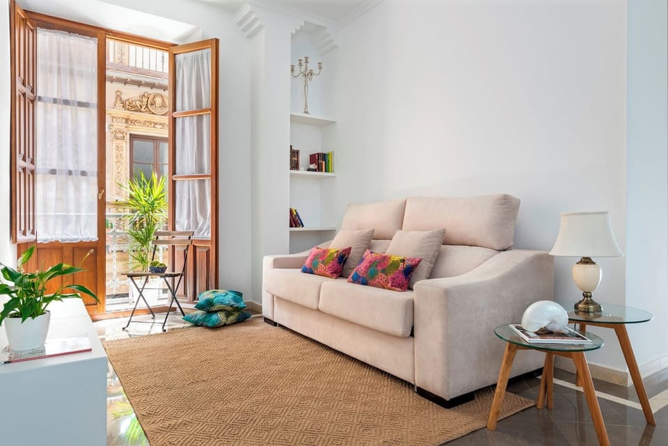 Apartment (1 Bedroom) | Living area | 32-inch TV with cable channels