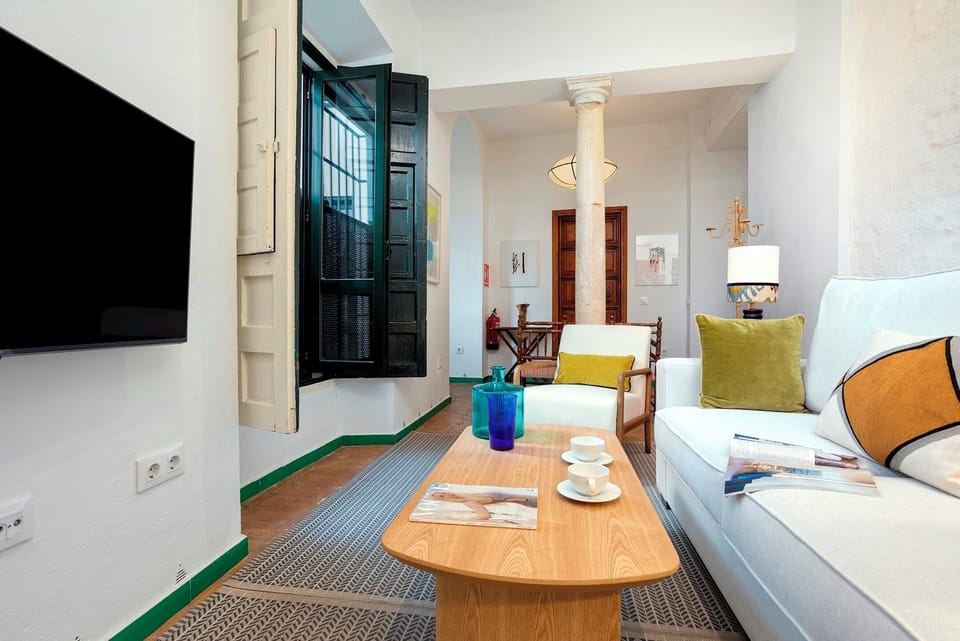 Apartment (2 Bedrooms) | Living area | 32-inch TV with cable channels