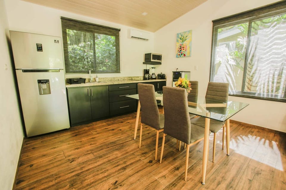 Full-size fridge, microwave, stovetop, electric kettle