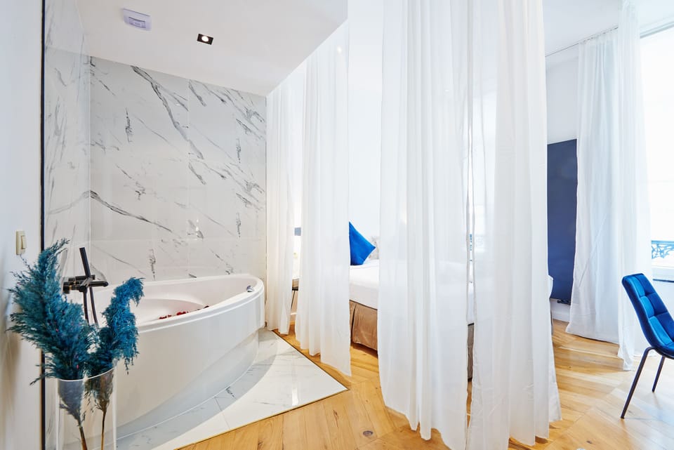 Honeymoon Double Room | Bathroom | Hair dryer, towels, toilet paper