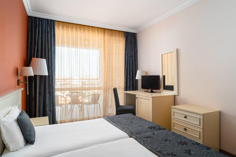 Minibar, desk, iron/ironing board, free WiFi
