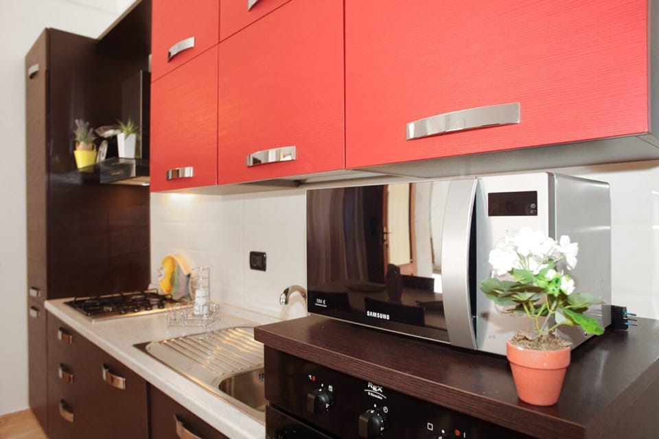 Apartment, 2 Bedrooms | Private kitchen | Full-size fridge, microwave, oven, stovetop