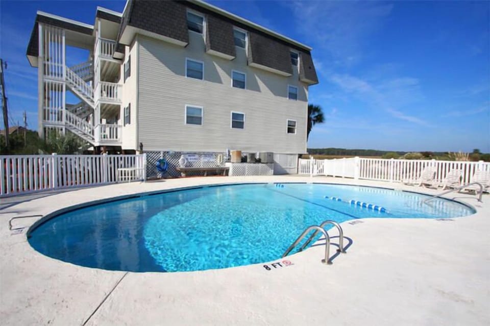 A refreshing dip in the pool feels great after a day in the sand and sun.