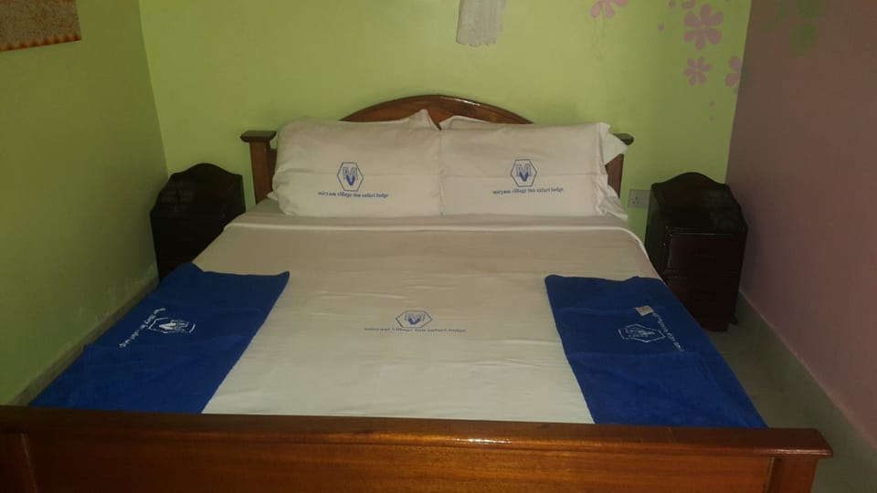 Deluxe Single Room | Memory foam beds, desk, blackout drapes, iron/ironing board