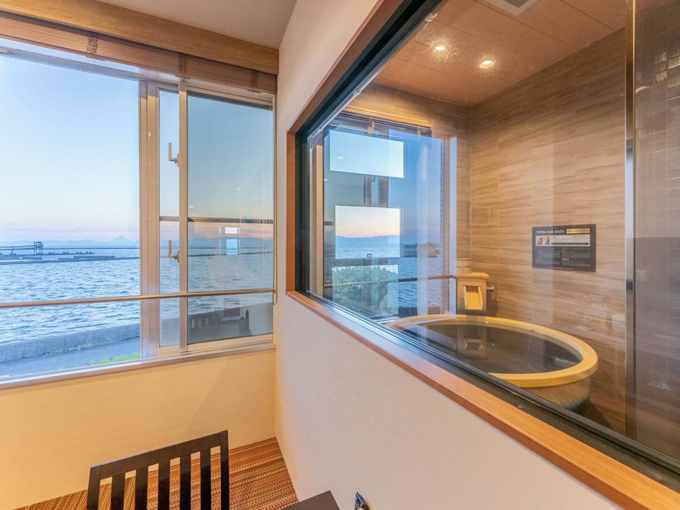 Standard Twin Room, Smoking, Ocean View | In-room safe, WiFi (free), bed sheets