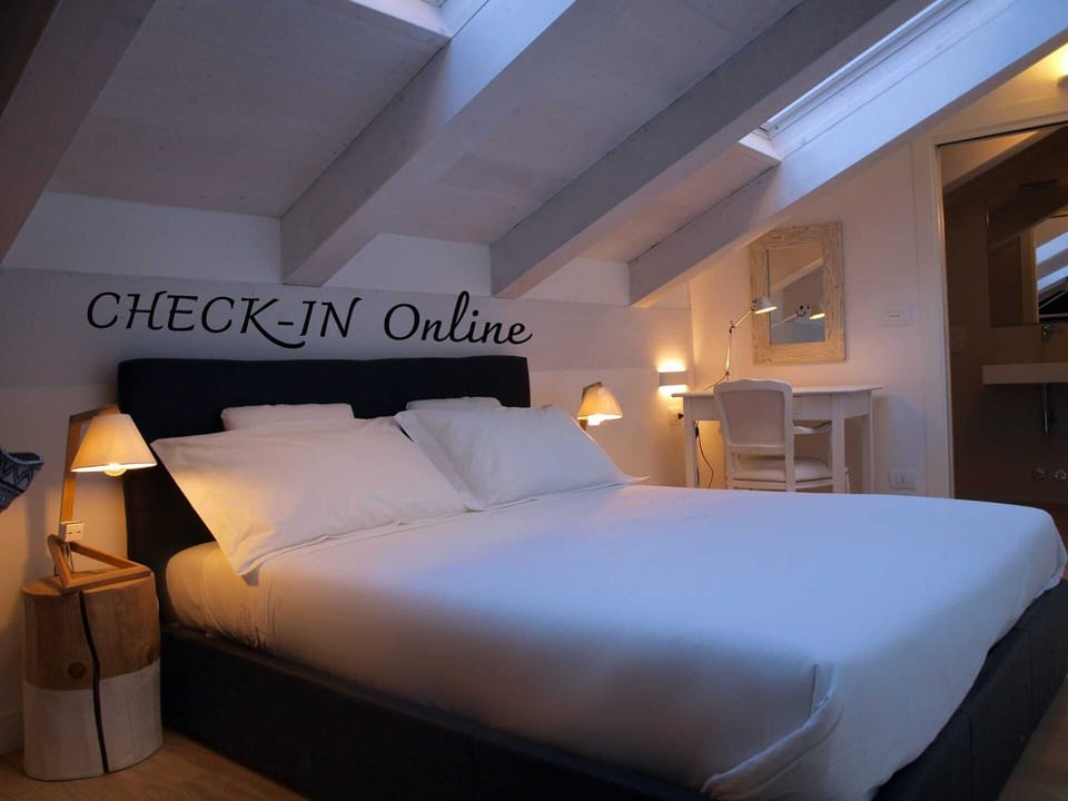 Family Triple Room | Individually decorated, individually furnished, desk, blackout drapes