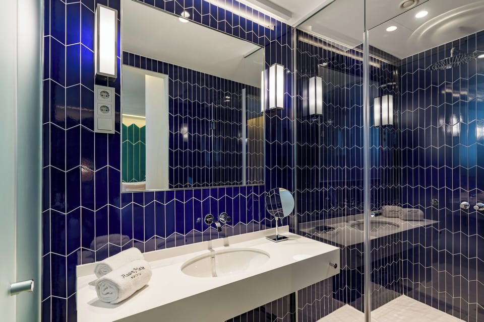 Eco-friendly toiletries, hair dryer, towels, soap