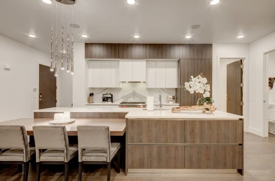 Kitchen with Wolf appliances and breakfast bar seating