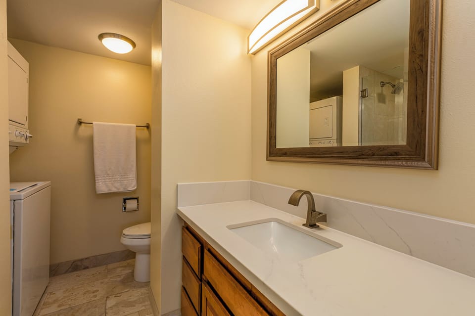 You can find the washer and dryer in the ensuite