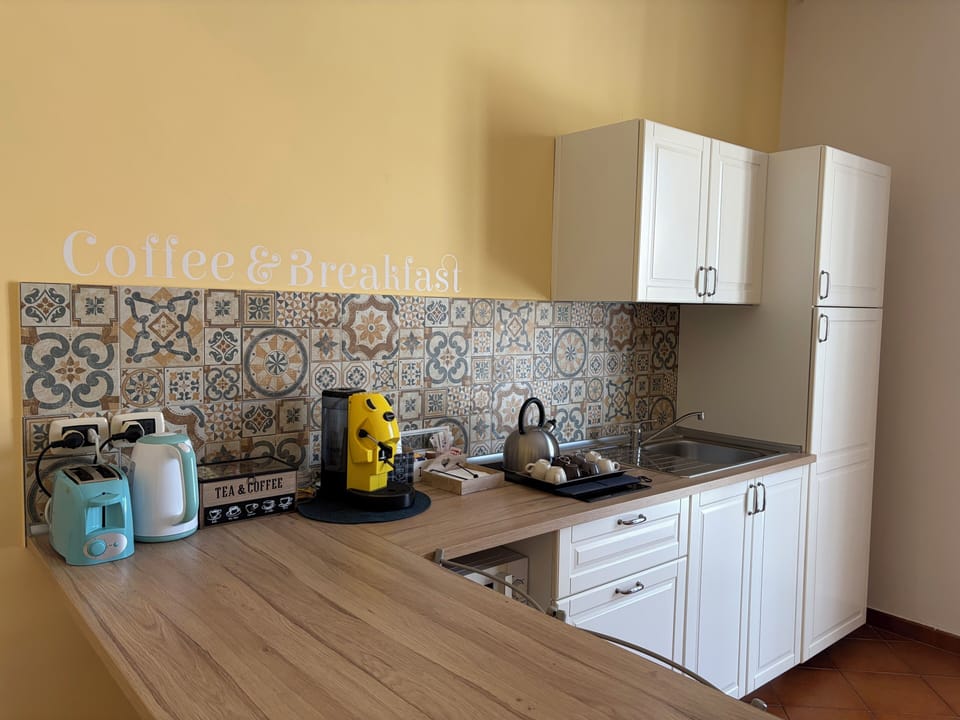 Full-size fridge, microwave, stovetop, espresso maker