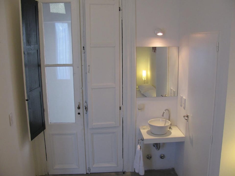 Shower, rainfall showerhead, hair dryer, towels
