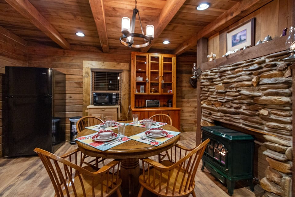 Gas stove next to the dining table in kitchen