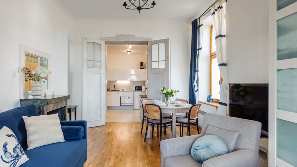 Apartment (Traugutta 8/1) | Living area | Flat-screen TV, fireplace