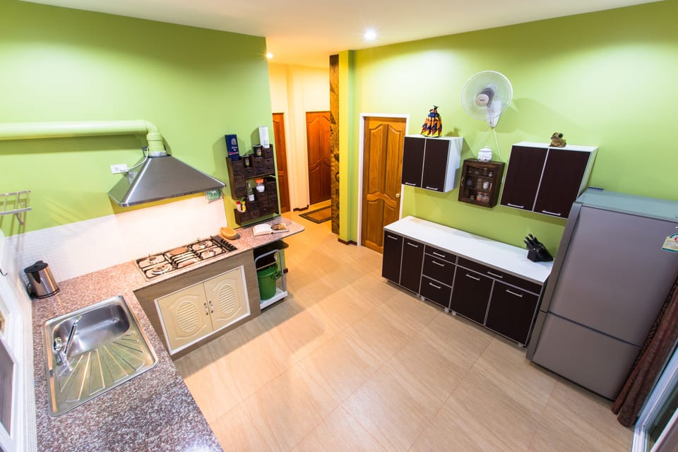 Full-size fridge, microwave, stovetop, coffee/tea maker