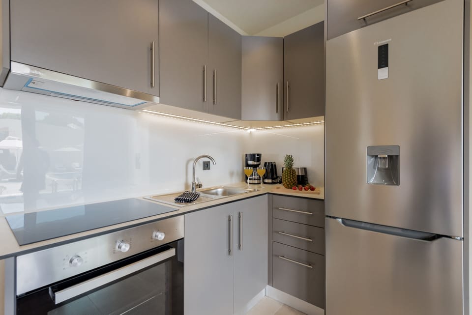 Superior 2-Bedroom Apartment | Private kitchen | Full-size fridge, oven, stovetop, espresso maker