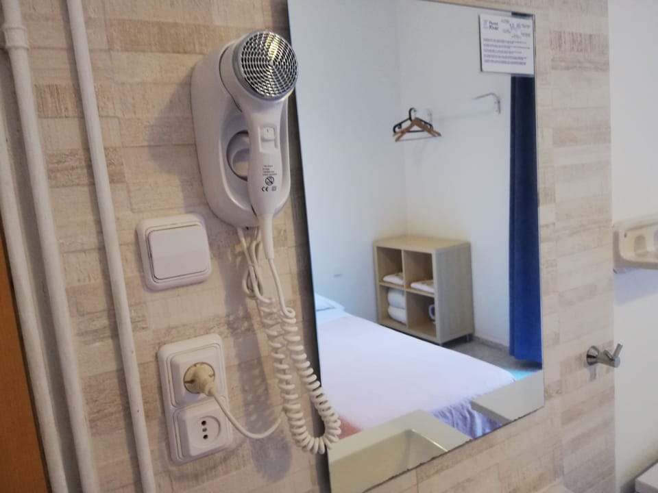 Hair dryer, towels, soap, shampoo