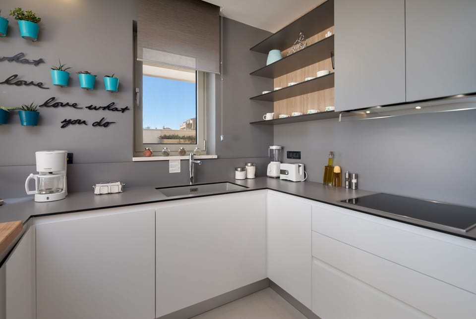 Luxury Villa | Private kitchen | Full-size fridge, microwave, oven, stovetop