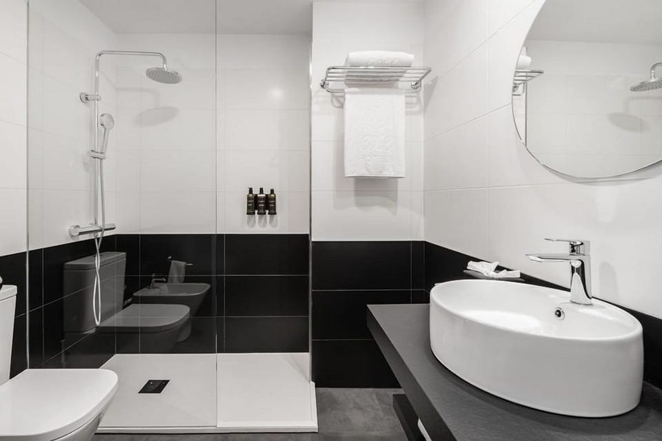 Eco-friendly toiletries, hair dryer, towels