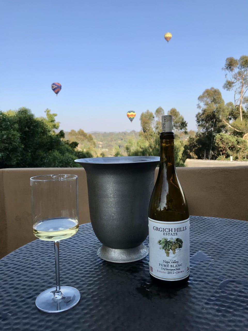 Toast the evening on private master balcony.