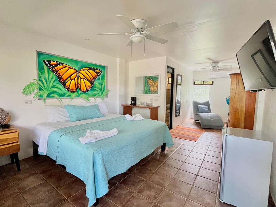 Deluxe Room, 1 King Bed | In-room safe, individually decorated, individually furnished