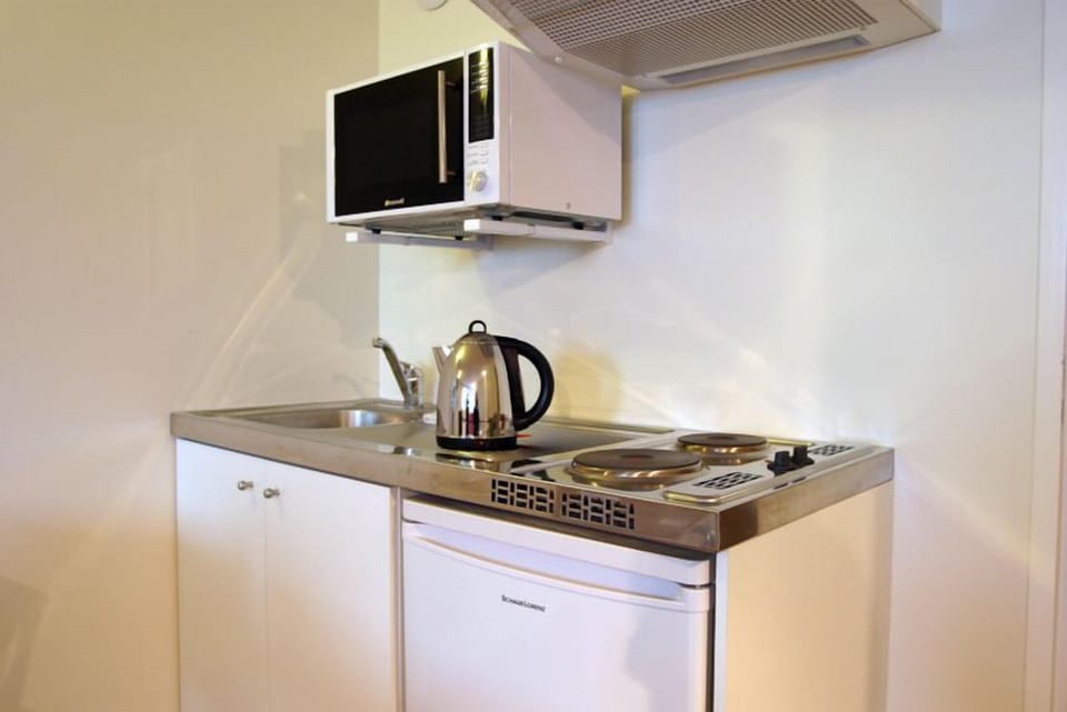 Classic Apartment, 1 Bedroom | Private kitchenette | Espresso maker, coffee/tea maker, electric kettle