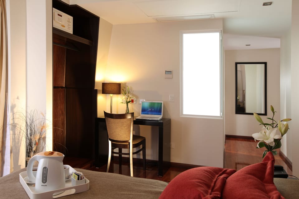Suite, 1 Double Bed | Pillowtop beds, minibar, in-room safe, desk