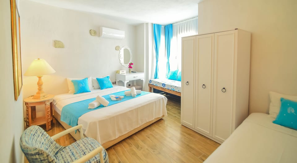 Luxury Quadruple Room | Premium bedding, Select Comfort beds, free minibar items, in-room safe