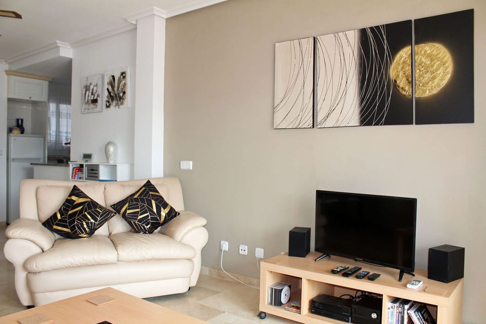 Spacious Living Room with UK TV