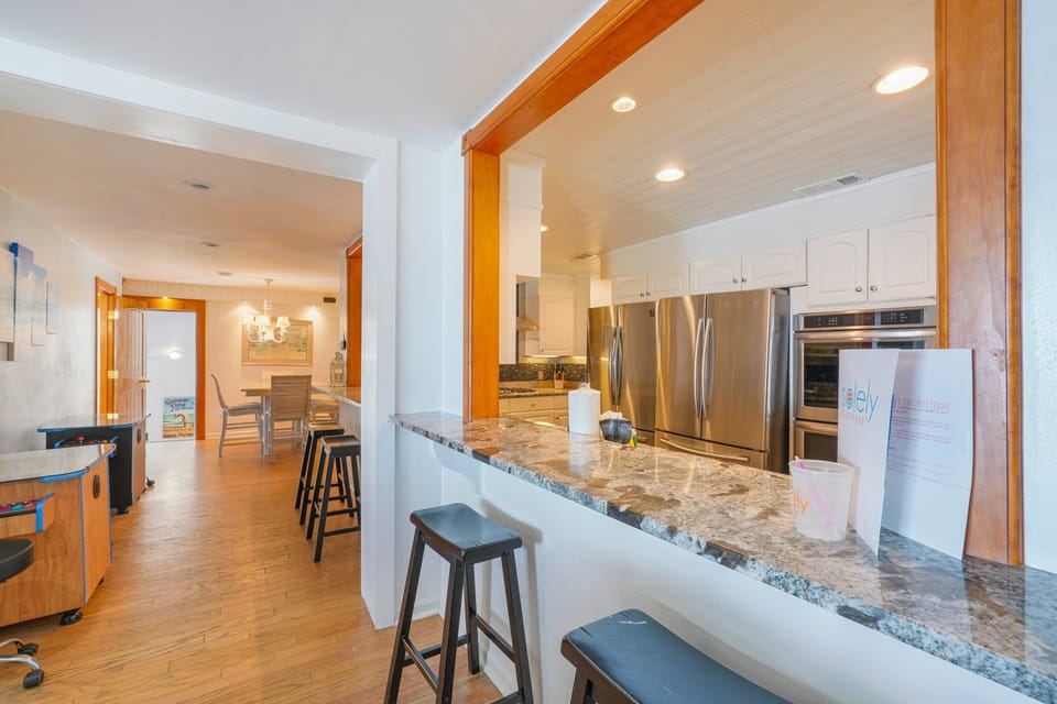 Gather around the kitchen after a fun filled day on the Emerald Coast