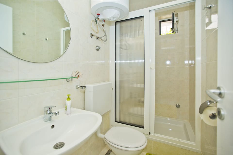 Standard Apartment, 1 Bedroom, Terrace, Partial Sea View | Bathroom | Shower, hair dryer, towels