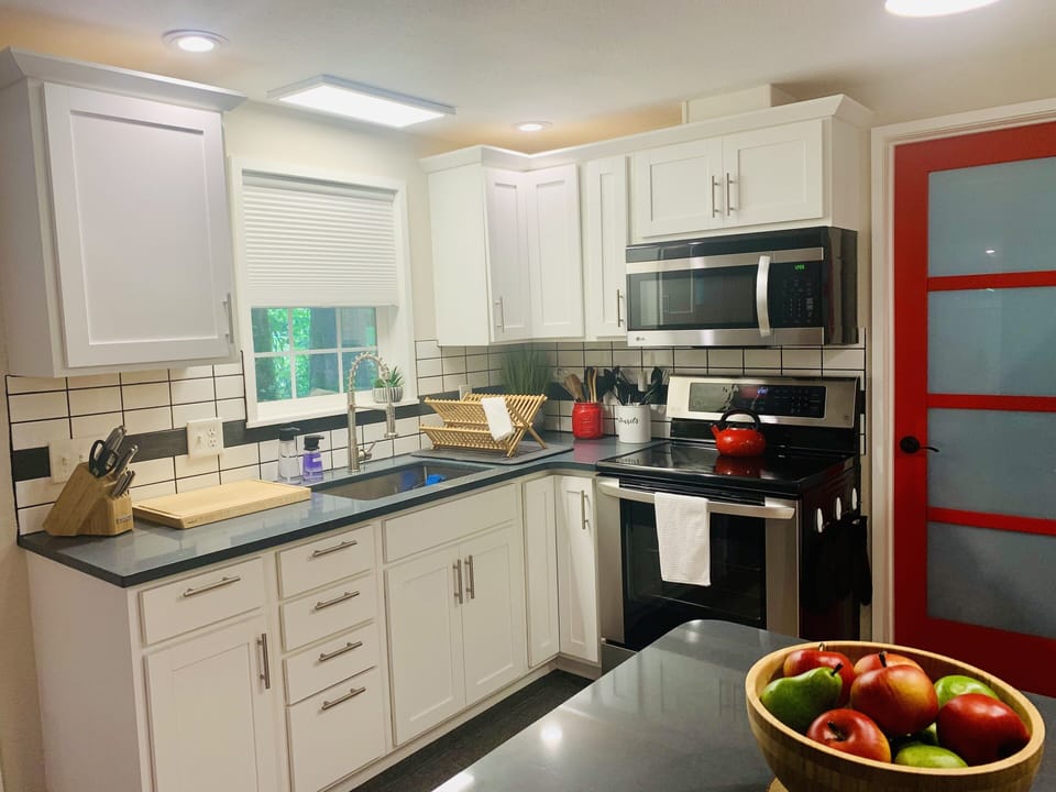A fully stocked kitchen! Dishware, utensils, cookware, etc.