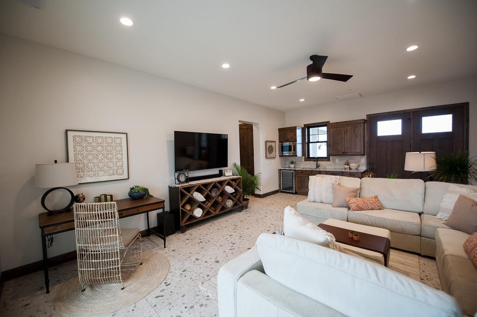 Adjoining recreation room on main level with kitchenette and separate entrance