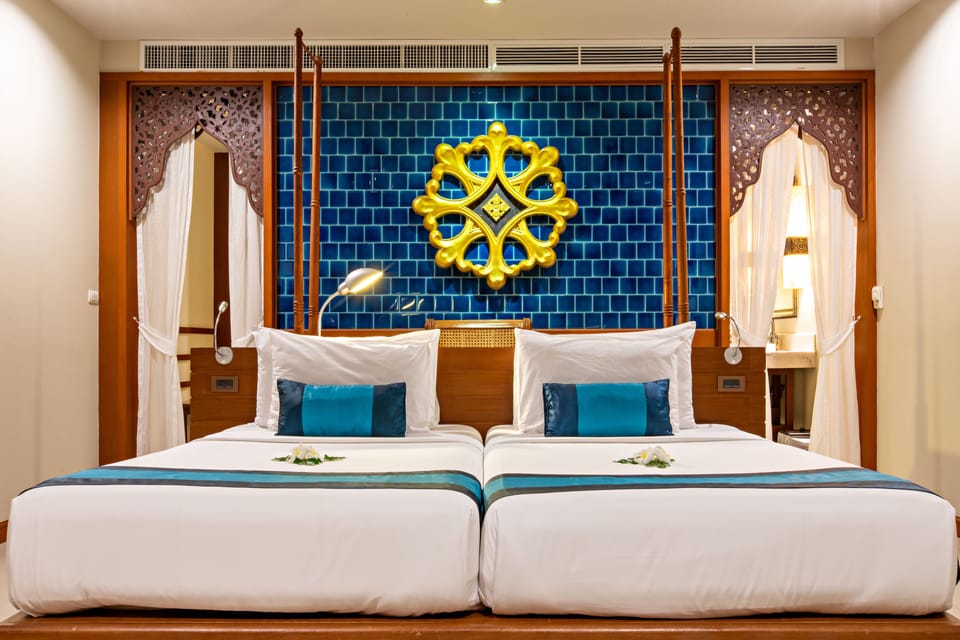Deluxe Room, Pool View | Pillowtop beds, minibar, in-room safe, desk