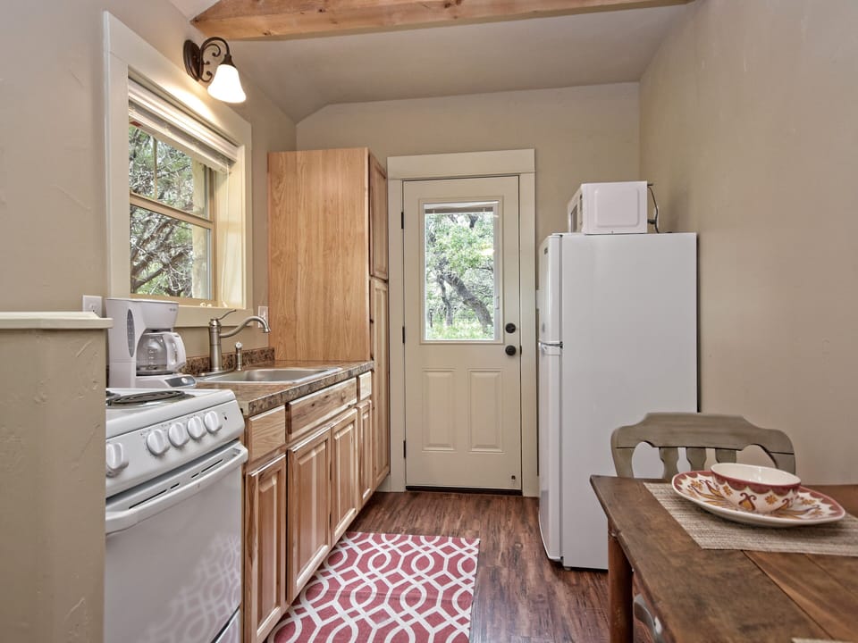 Looking from the front door through the kitchen to the side door