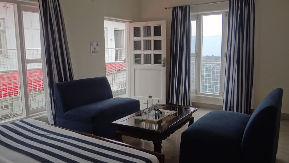 Family Suite Room | Laptop workspace, free WiFi, bed sheets
