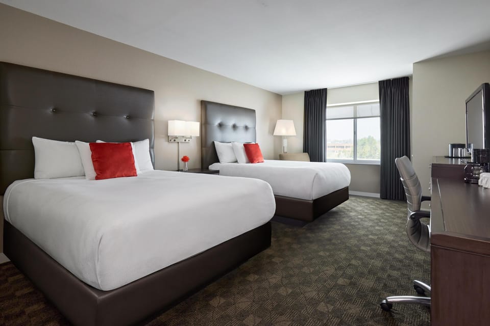 Premium bedding, down comforters, desk, laptop workspace