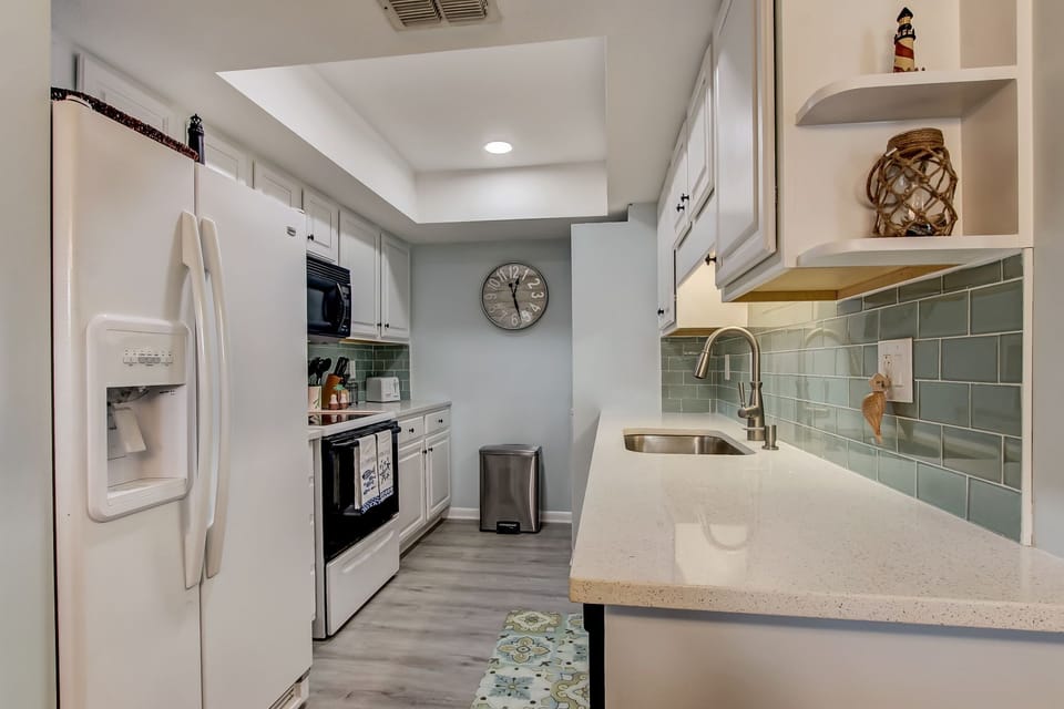 New countertops and backsplash in Kitchen