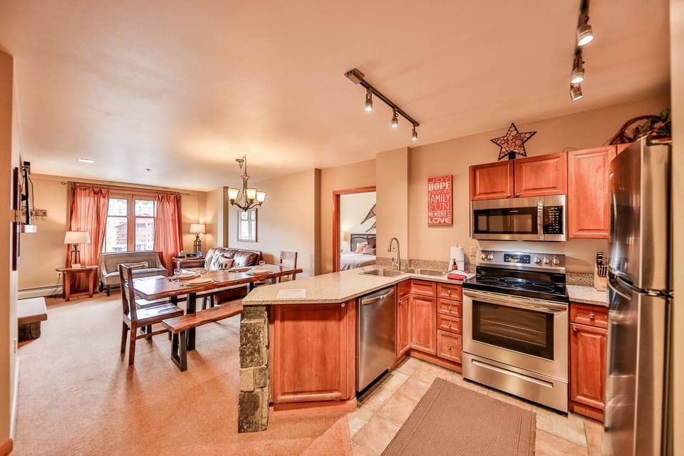 Open-concept kitchen and living area with all of your kitchen needs