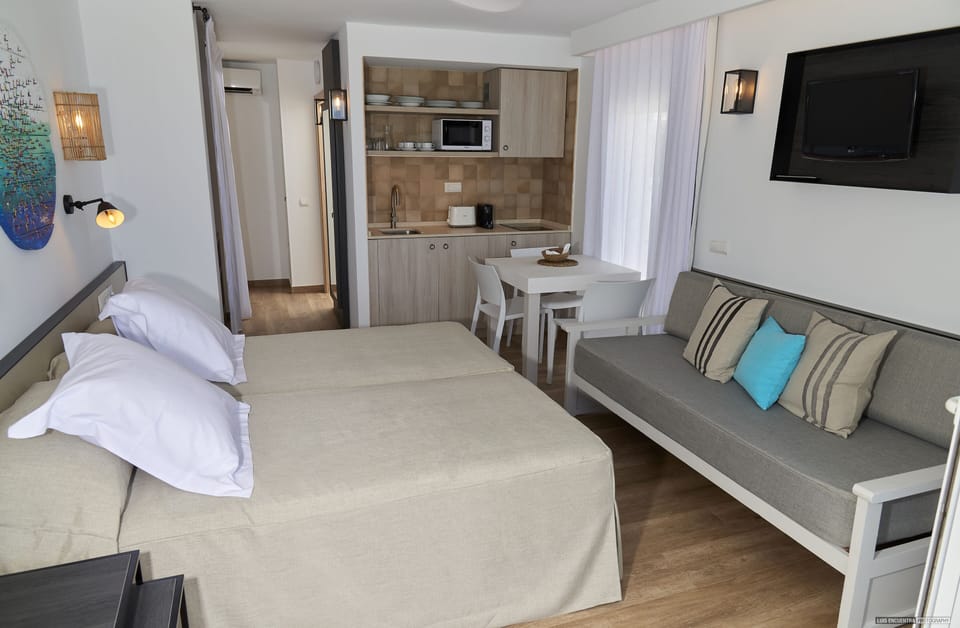 Studio, Balcony, Sea View | Living area | Flat-screen TV