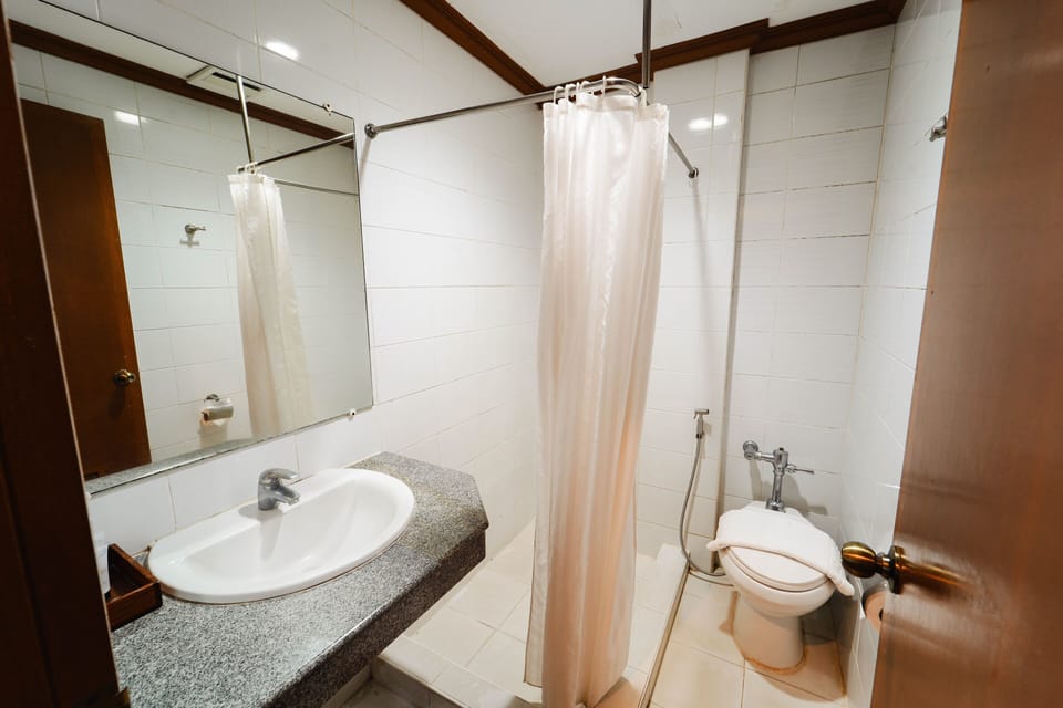 Superior Room | Bathroom | Shower, bathrobes, towels
