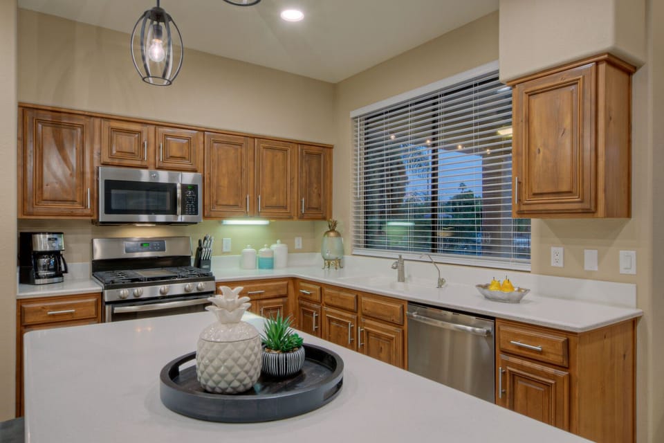 Generous counter and island space for prepping and serving your choice of cuisine.