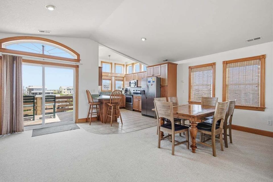 Top-Level Living Room with Deck Access