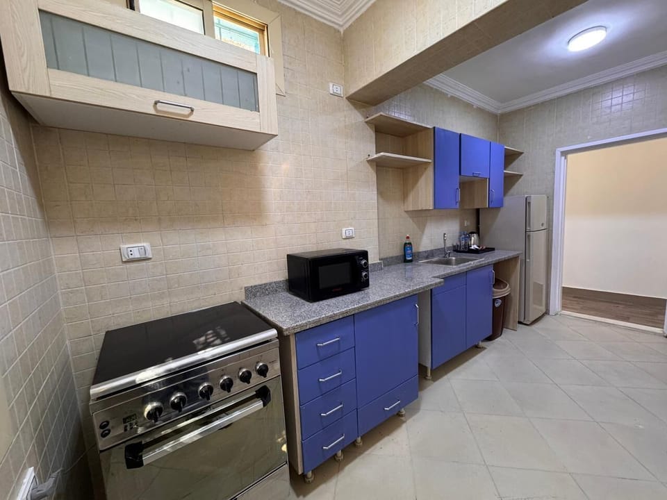Superior Chalet | Private kitchen | Mini-fridge, cleaning supplies, paper towels